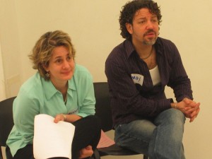 Helen Wheelock and actor/teacher Max Ryan listen to teachers present during a professional development session.